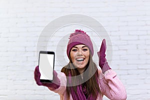 Attractive Teenage Girl Displaying Cell Smart Phone Touch Screen Empty Space