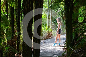 Attractive teenage girl on path of bush walk