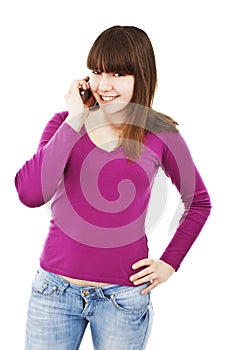 Attractive teenage girl talking on the phone