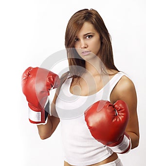 Attractive teenage woman boxing gloves