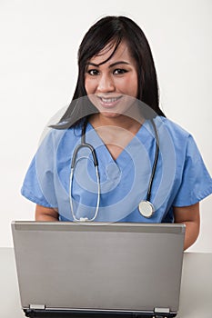 Attractive thirties asian female healthcare worker