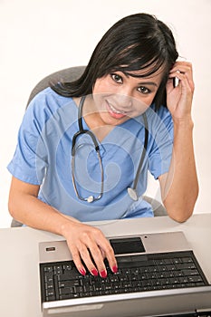 Attractive thirties asian female healthcare worker