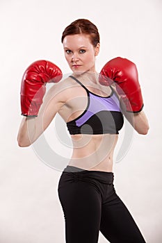 Attractive thirties caucasian woman exercising