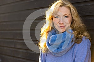 Attractive Thoughtful Smiling Middle Aged Woman Outside