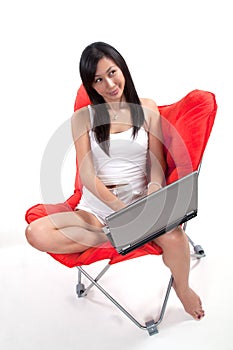 Attractive twenties asian woman relaxing