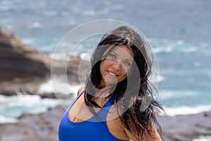 Attractive windblown natural young woman photo