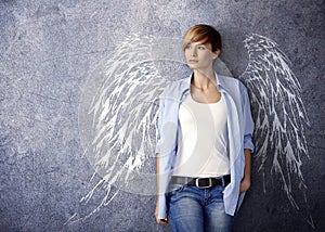 Attractive woman with angel wings