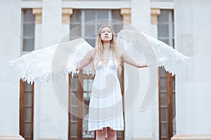 Attractive woman with angel wings