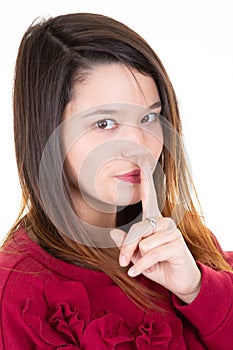 Attractive woman asking for silence isolated