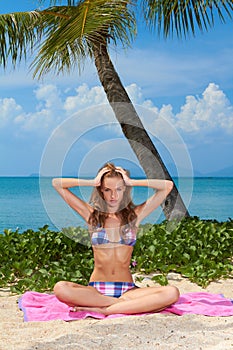 Attractive woman on beautiful sandy beach