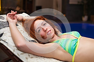 Attractive woman in bikini relaxing