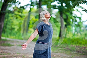 Attractive woman breathing and relaxing