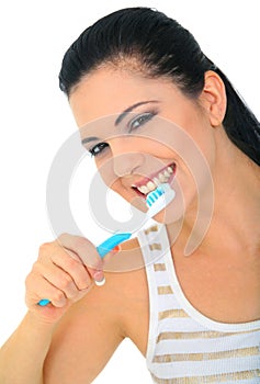 Attractive Woman Brushing Teeth Isolated