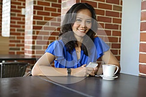 Attractive woman in cafe