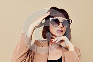 attractive woman Charm red nails model luxury sunglasses isolated background