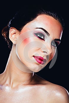 Attractive woman with colourful makeup