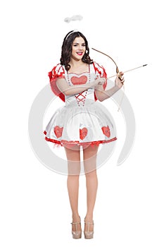 Attractive woman cupid with bow and arrow ready to