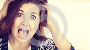 Woman having shocked amazed face expression