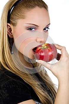 Attractive woman eating an apple , promoting healthy lifestyle