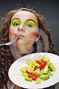 Attractive woman eating healthy food