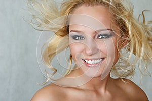 Attractive woman with fly-away hair