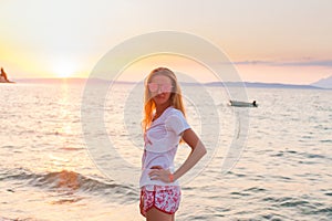 Attractive woman in front of the sea