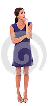 Attractive woman with hand on chin wondering