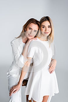 attractive woman with her daughter isolated