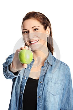 Attractive woman holding an apple