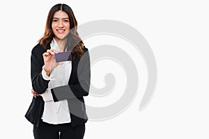 Attractive woman holding a credit card