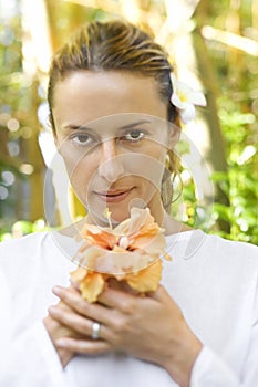 Attractive Woman Holding Flower