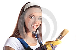 Attractive woman holding a paint brush