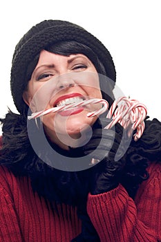 Attractive Woman Holds Candy Canes