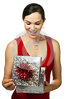 Attractive woman opening gift box