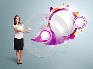 Attractive woman presenting abstract speech bubble copy space