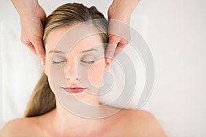 Attractive Woman Receiving Head Massage At Health Spa