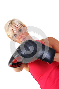 Attractive woman shadow boxing
