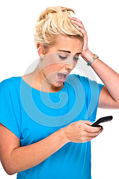 Attractive Woman Shocked by Cell Phone Message