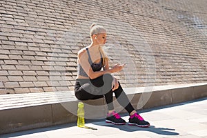 Attractive woman in sportswear training outdoor. Sport, jogging, healthy and active lifestyle.