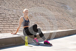 Attractive woman in sportswear training outdoor. Sport, jogging, healthy and active lifestyle.