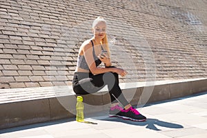 Attractive woman in sportswear training outdoor. Sport, jogging, healthy and active lifestyle.