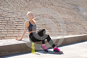 Attractive woman in sportswear training outdoor. Sport, jogging, healthy and active lifestyle.