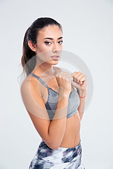 Attractive woman standing in defence stance