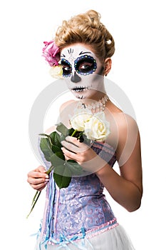 Attractive woman with sugar skull make-up