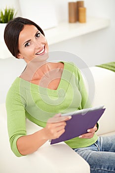 Attractive woman toothy smiling at the camera