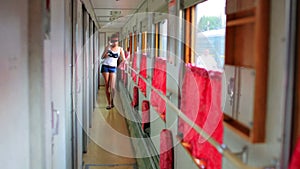 Attractive woman at train corridor