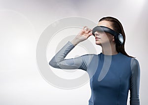 Attractive woman using virtual reality headset