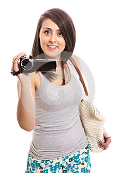 Attractive woman with video recorder