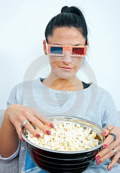 Attractive woman wearing 3-d glasses