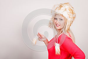 Attractive woman wearing furry winter hat